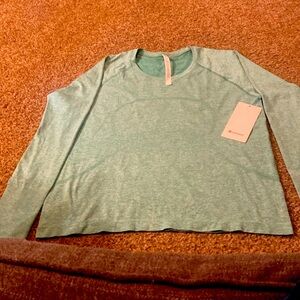 Lululemon green long sleeve shirt- NEW size 16